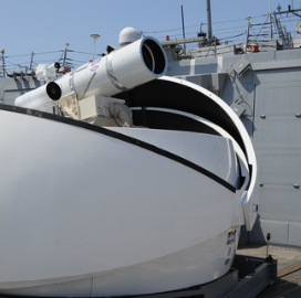 Pentagon Adviser Howard Meyer: Laser Weapons Tech Programs Ready to Accelerate - top government contractors The Navy’s “Laser Weapon System†(LaWS) prototype aboard ship.