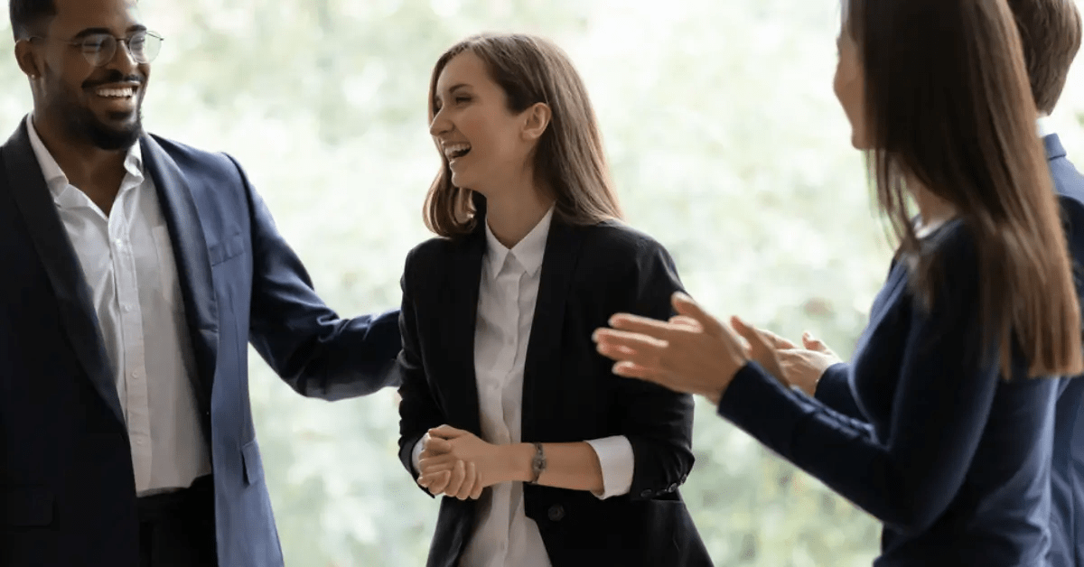 GSA Contracting 101: Everything Government Contractors Should Know - top government contractors A group of professionals celebrating