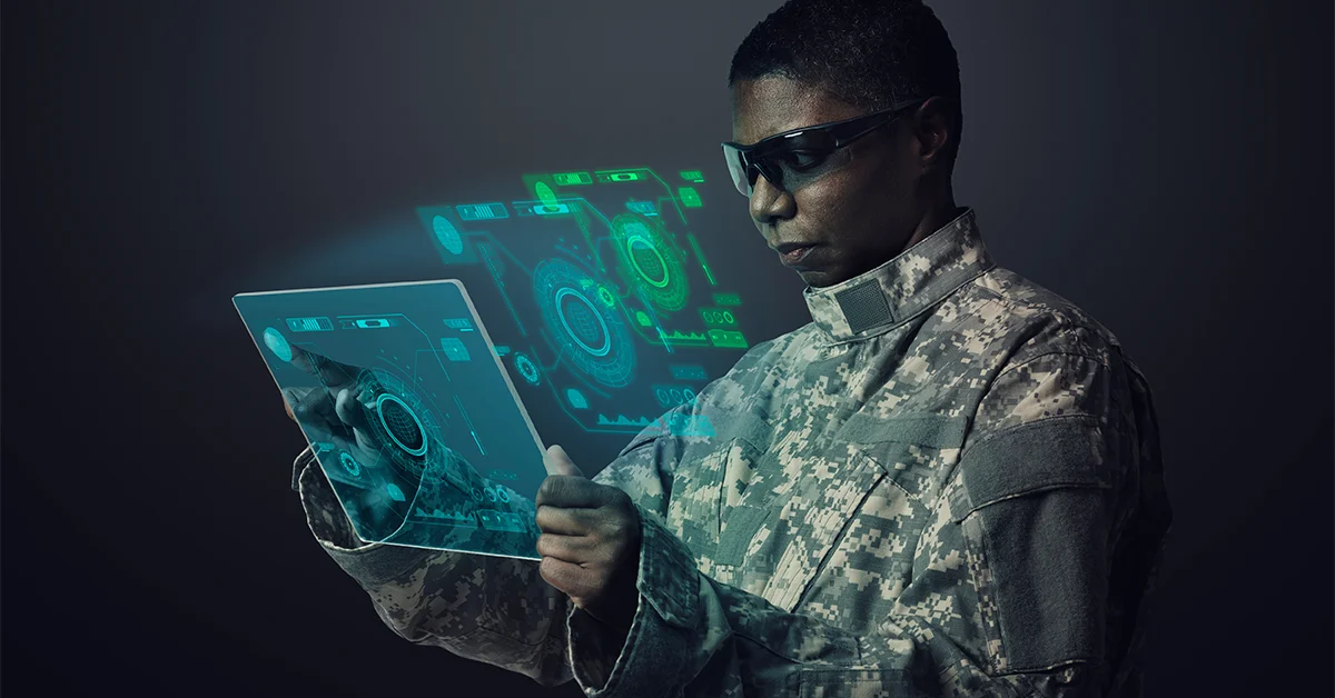 Army APNT CFT Director Michael Monteleone to Speak at 2024 Army Summit - top government contractors A military officer using a tablet with sensing technology
